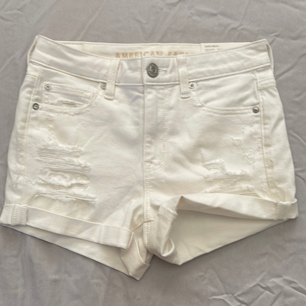 American Eagle Outfitters distressed white jean shorts, size 4